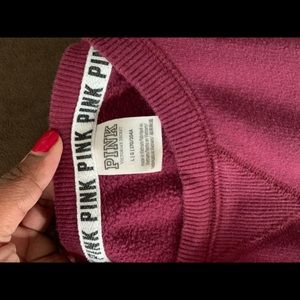 Size Med pants and Large Shirt..Color is burgundy